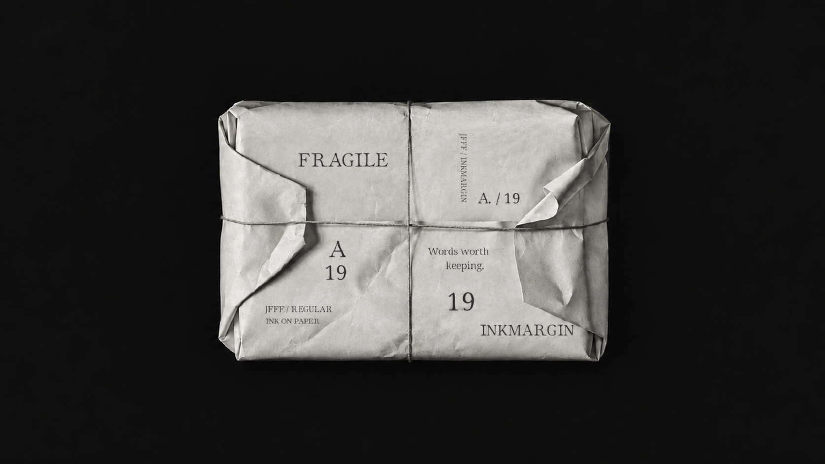 INKMARGIN on a wrapped paper parcel.